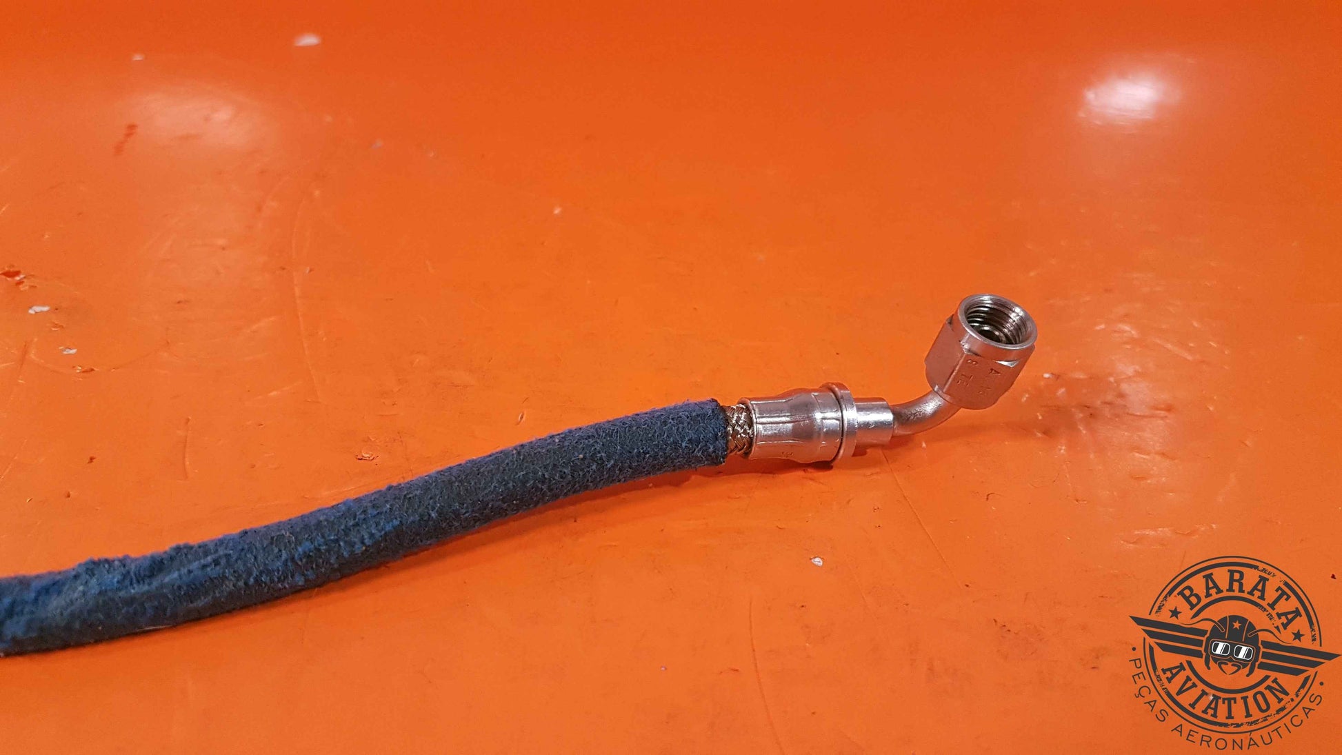 AE4700E0130-320   Hose Assy