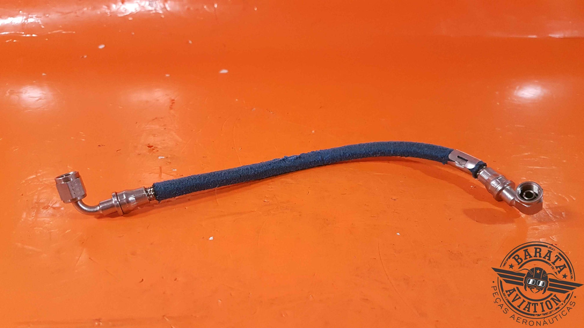 AE4700E0130-320   Hose Assy