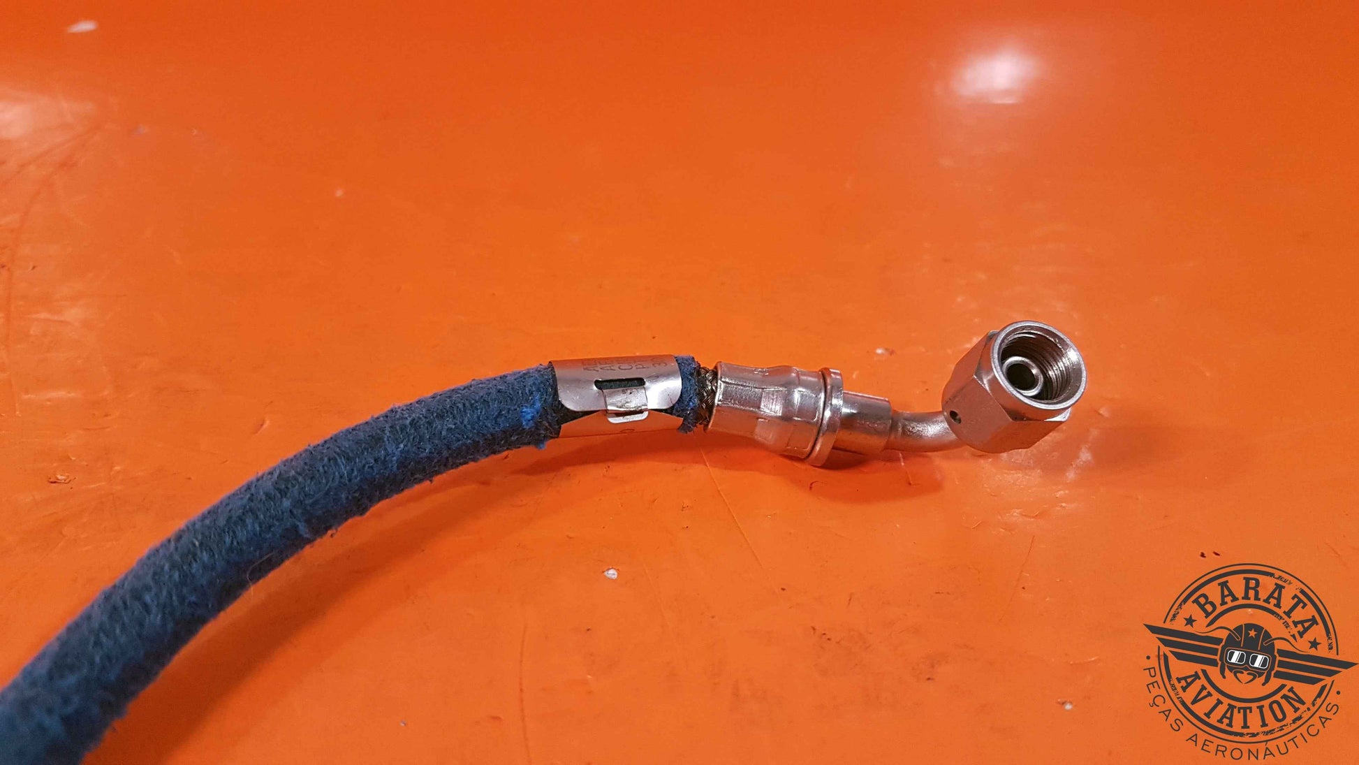 AE4700E0130-320   Hose Assy